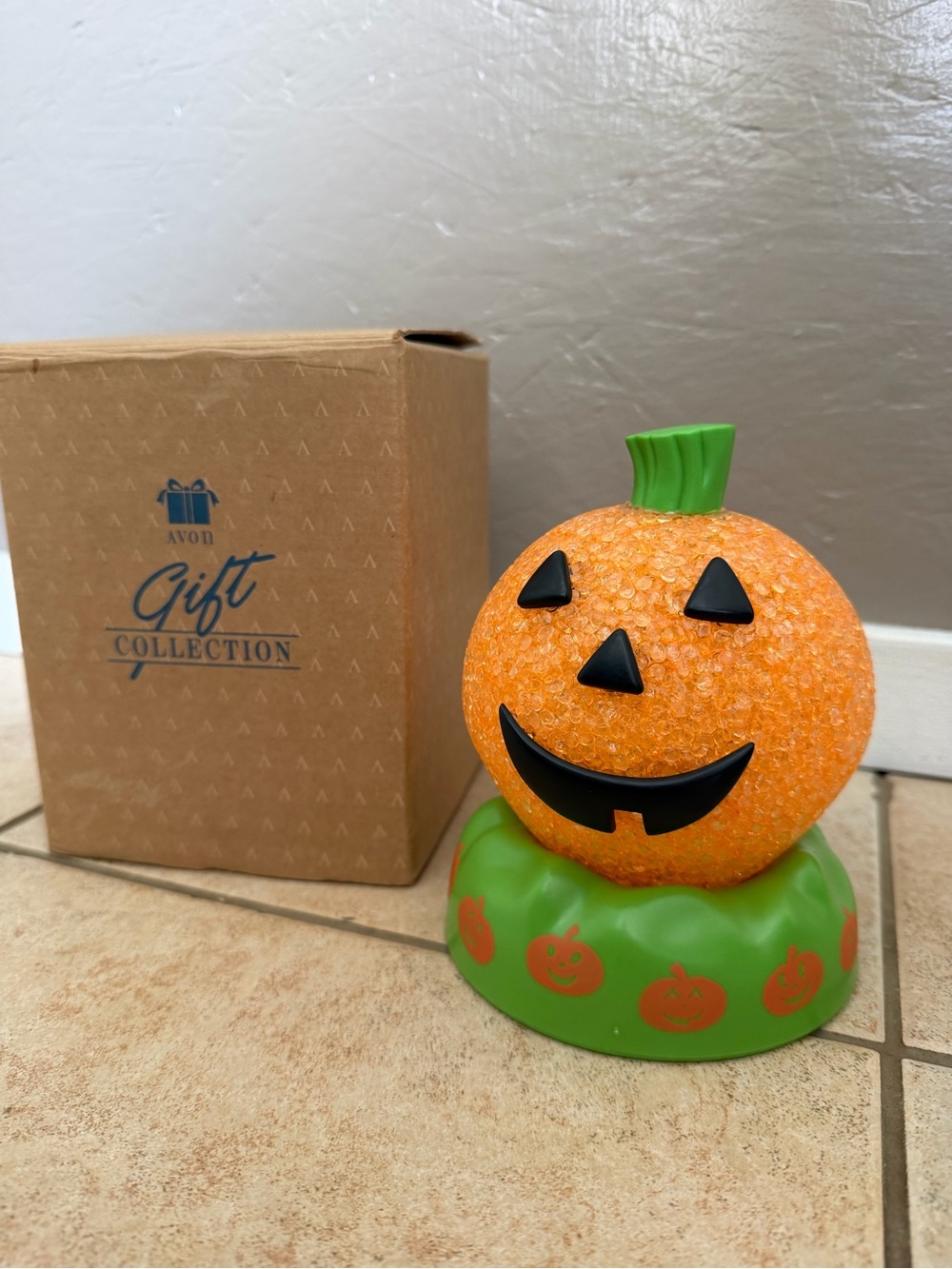 Avon Orange Pumpkin Jack-O'-Lantern Light with Green Base